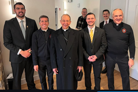 Blessing and dedication of the Michael J. McGivney Propaedeutic House of Formation on January 24, 2025. L-R: Samuel Ghering (Erie), Fr. David Renne, Vice-Rector of St. Mark Seminary, Archbishop William Lori, Tyler Smart (Erie), Fr. Scott Jabo. Sam and Tyler are seminarians in the Propaedeutic Program.